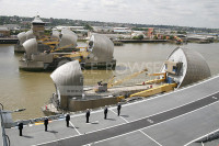 HMS Ark Royal passing through The Thames Barrier