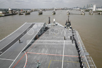 HMS Ark Royal ahead the Thames Barrier